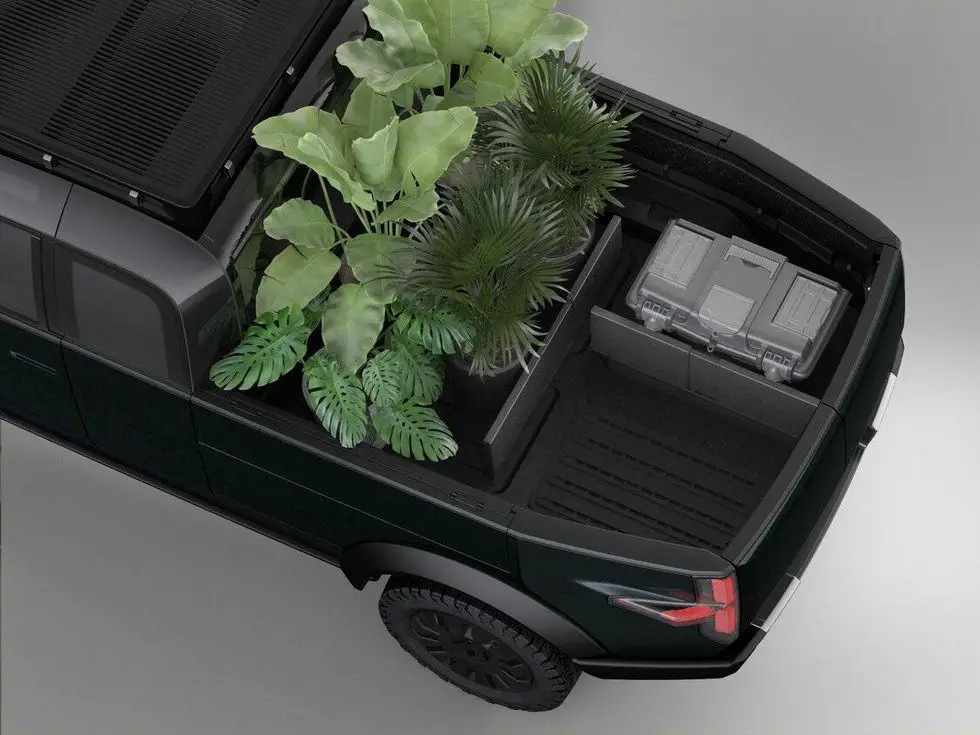 Canoo pickup truck features: cargo bed divider system