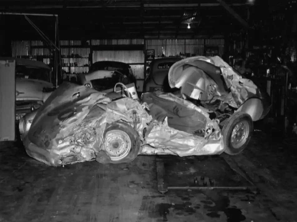 James Deal Porsche Spyder wreckage garage display
