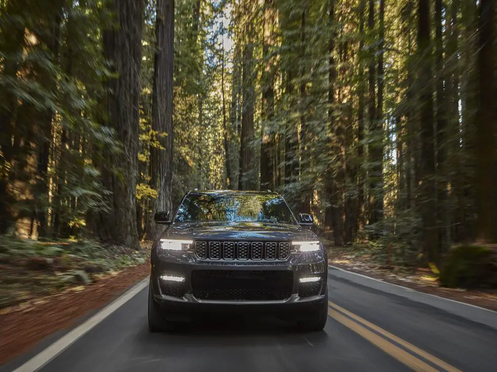 2021 Jeep Grand Cherokee L Summit Reserve: Exterior front headlights on forest tight