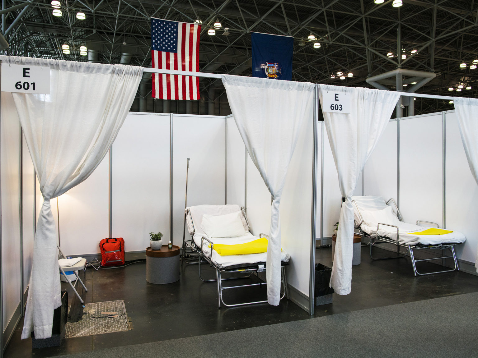 Hospital bed booths are set up at the Jacob K. Javits Convention Center which is being turned into a hospital to help fight coronavirus cases on March 27, 2020 in New York City. Gov.