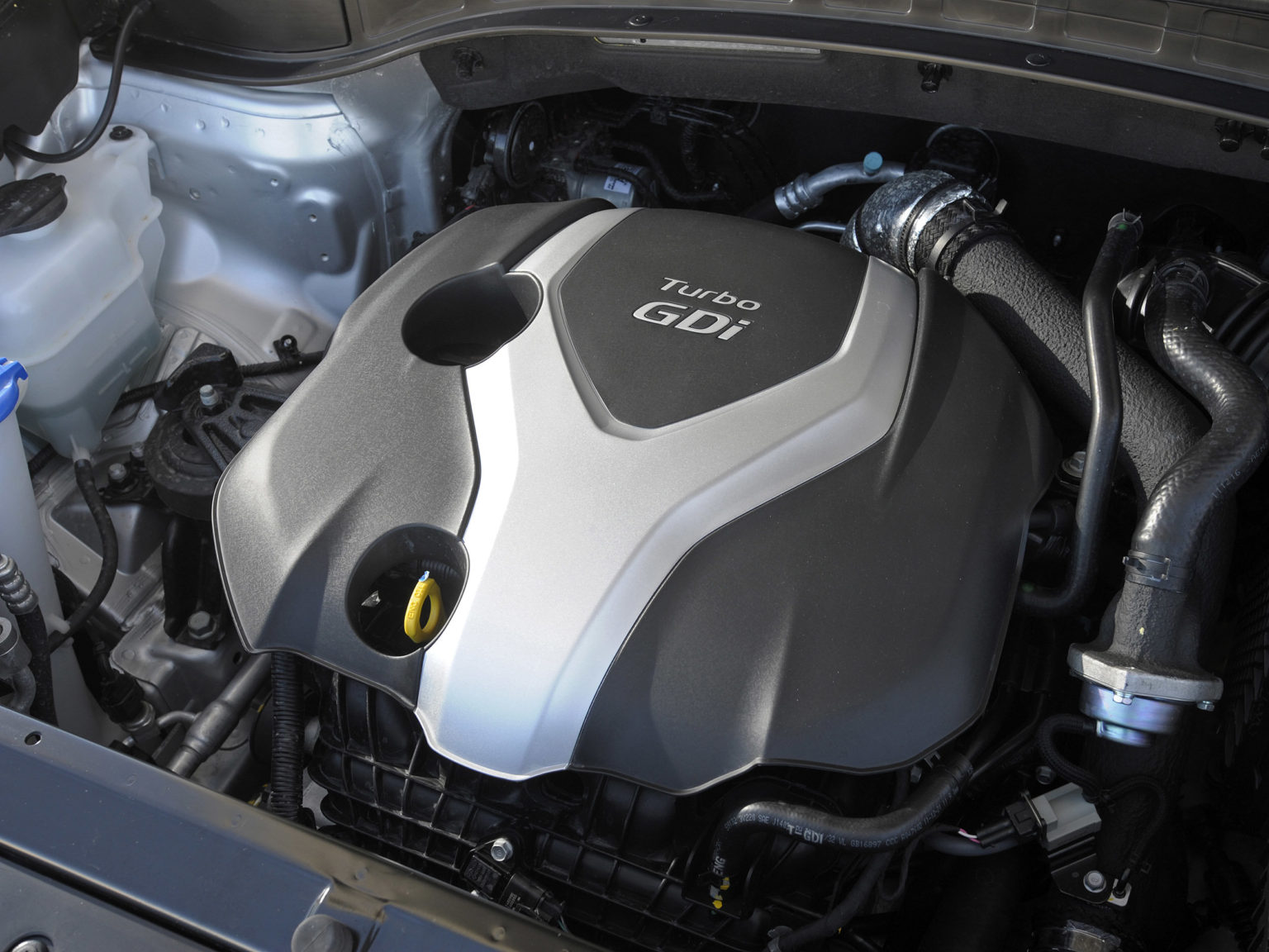 The Theta II engine, shown here in the 2013 Hyundai Santa Fe Sport, was the subject of a massive recall.