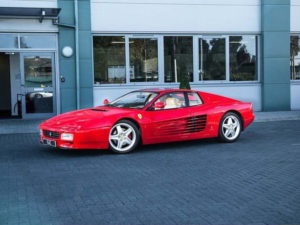 This Ferrari 512 was formerly owned by an English footballer and manager.