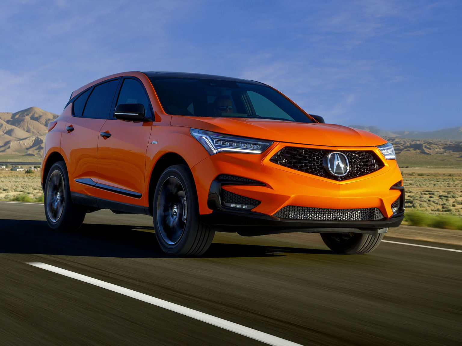 The 2021 Acura RDX PMC Edition features a thermal orange paint job that it shares with the Acura NSX.