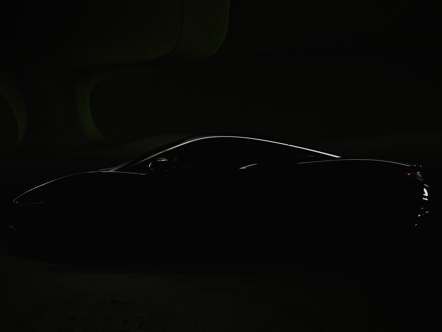 McLaren has released a teaser photo and video showing off its new hybrid car.