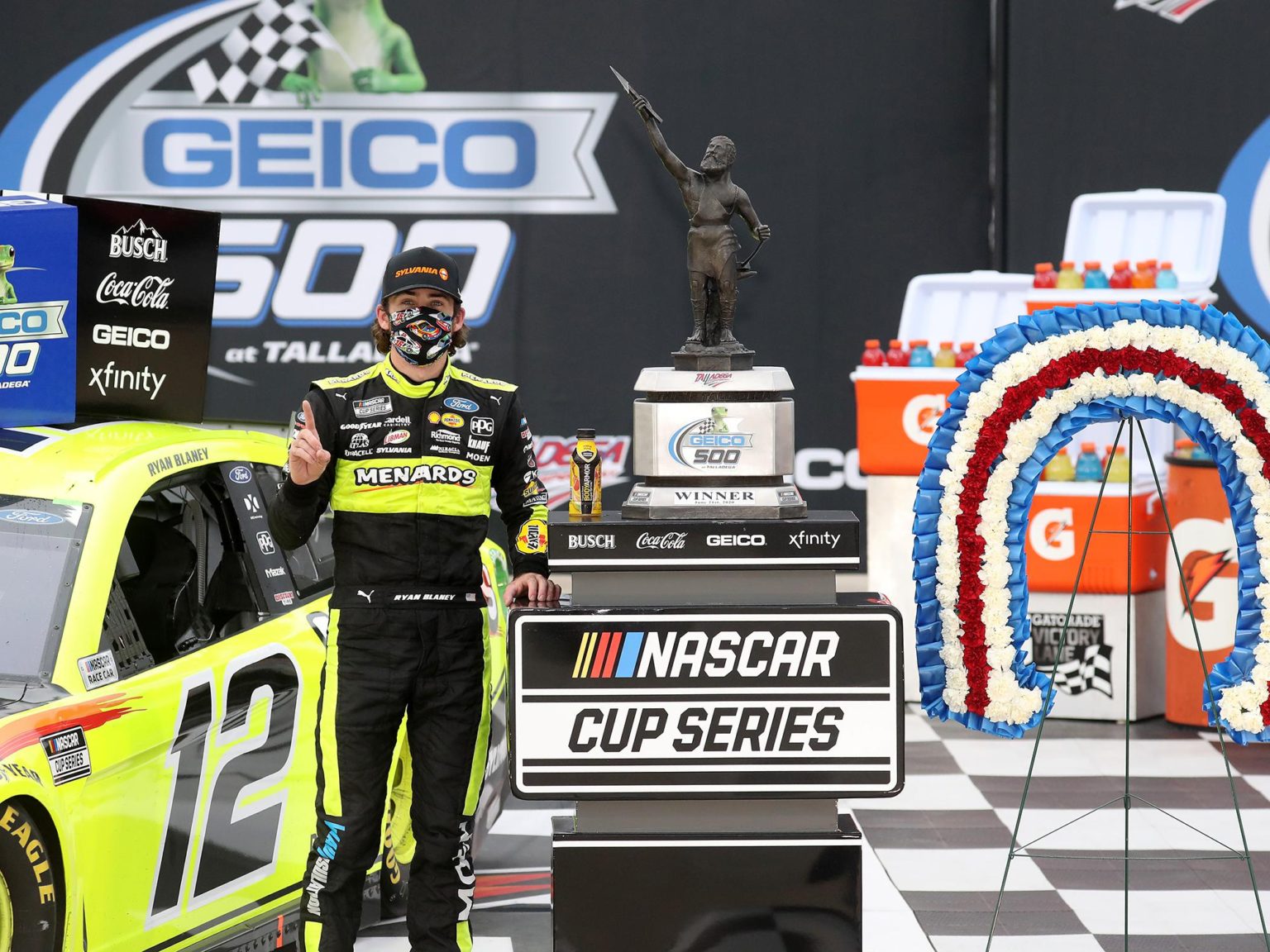 Ryan Blaney, driver of the #12 Menards/Sylvania Ford, celebrates in Victory Lane after winning the NASCAR Cup Series GEICO 500 at Talladega Superspeedway on June 22, 2020 in Talladega, Alabama.