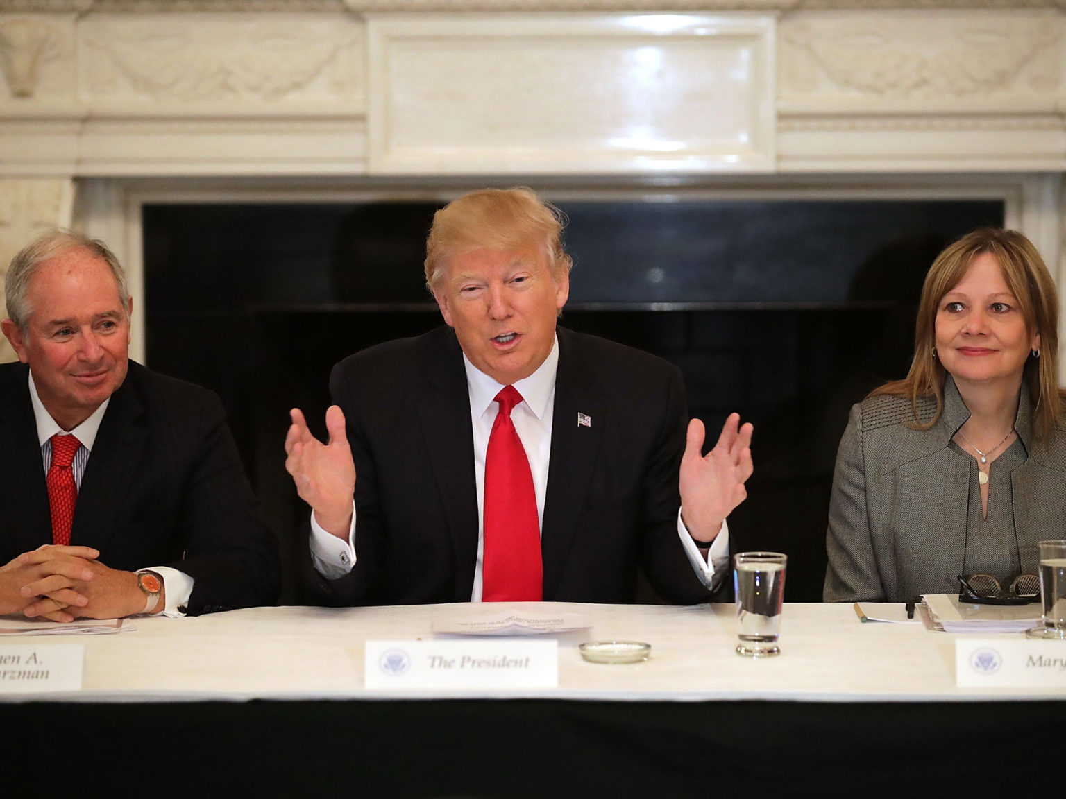 President Donald Trump (center) delivers opening remarks at the beginning of a policy forum with business leaders with General Motors CEO Mary Barra (right) and chaired by Blackstone Group CEO Stephen Schwarzman (left) in 2017. The President named Schwarzman and Barra to the newly formed Great American Economic Revival Industry Groups.