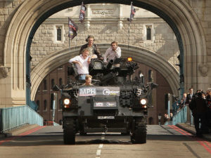 Television presenters Jeremy Clarkson, Richard Hammond and James May cross Tower Bridge on a military vehicle on September 1, 2008 in London. The trio took part in the stunt to promote a live travelling show version of their popular TV series Top Gear.