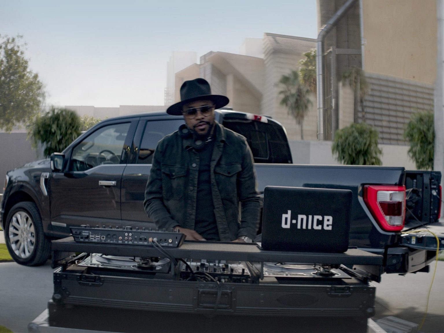 A new ad puts DJ D-Nice in the driver's seat of a 2021 Ford F-150.