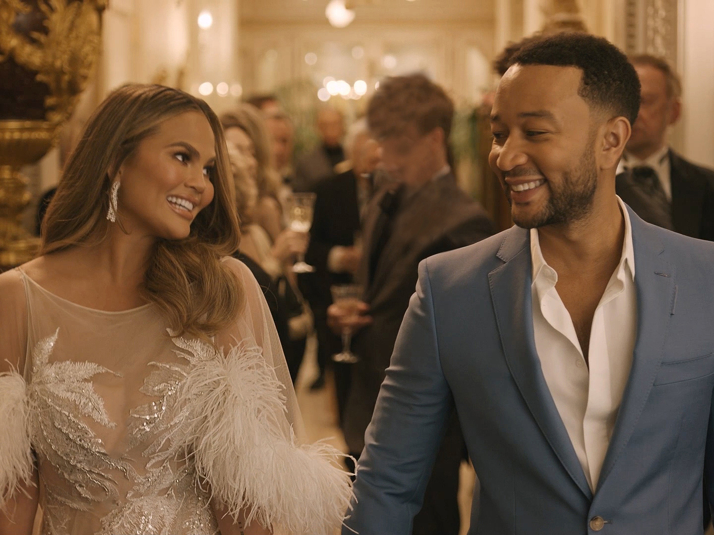 Entertainers Chrissy Teigen and John Legend star in this year's Genesis Super Bowl ad.