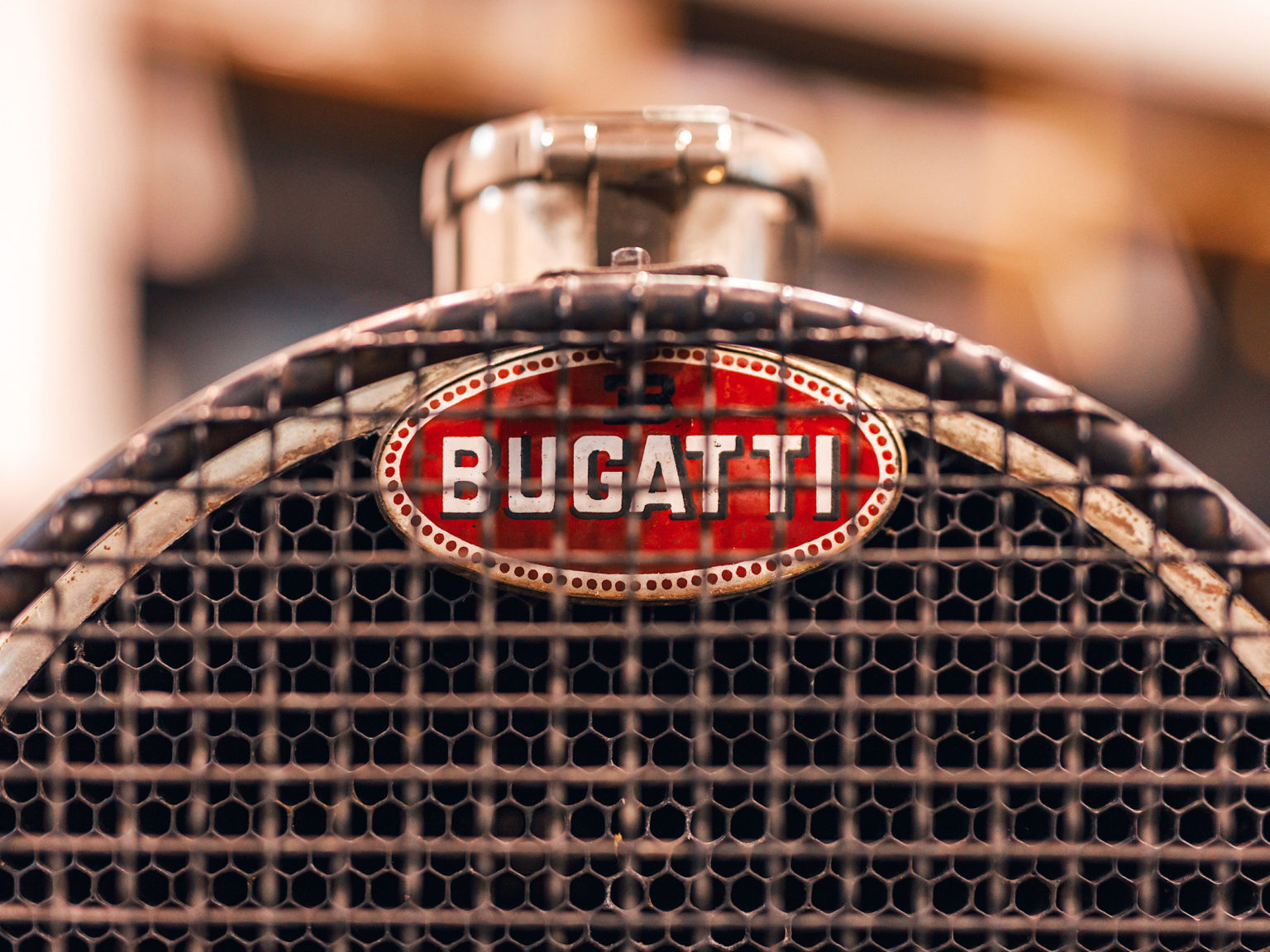 The Bugatti emblem is known as the Macaron